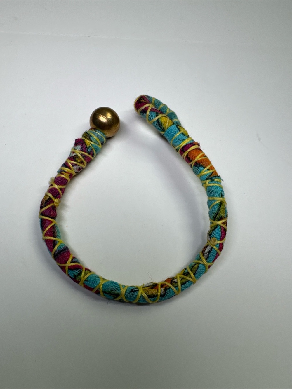Handmade Multicolor Fabric-Wrapped Cuff Bracelet with Gold Accent